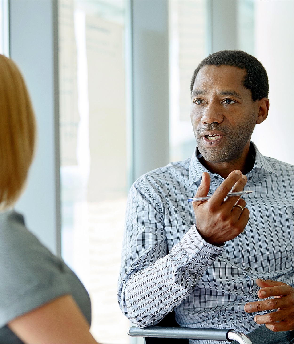 Salesman speaking to a customer