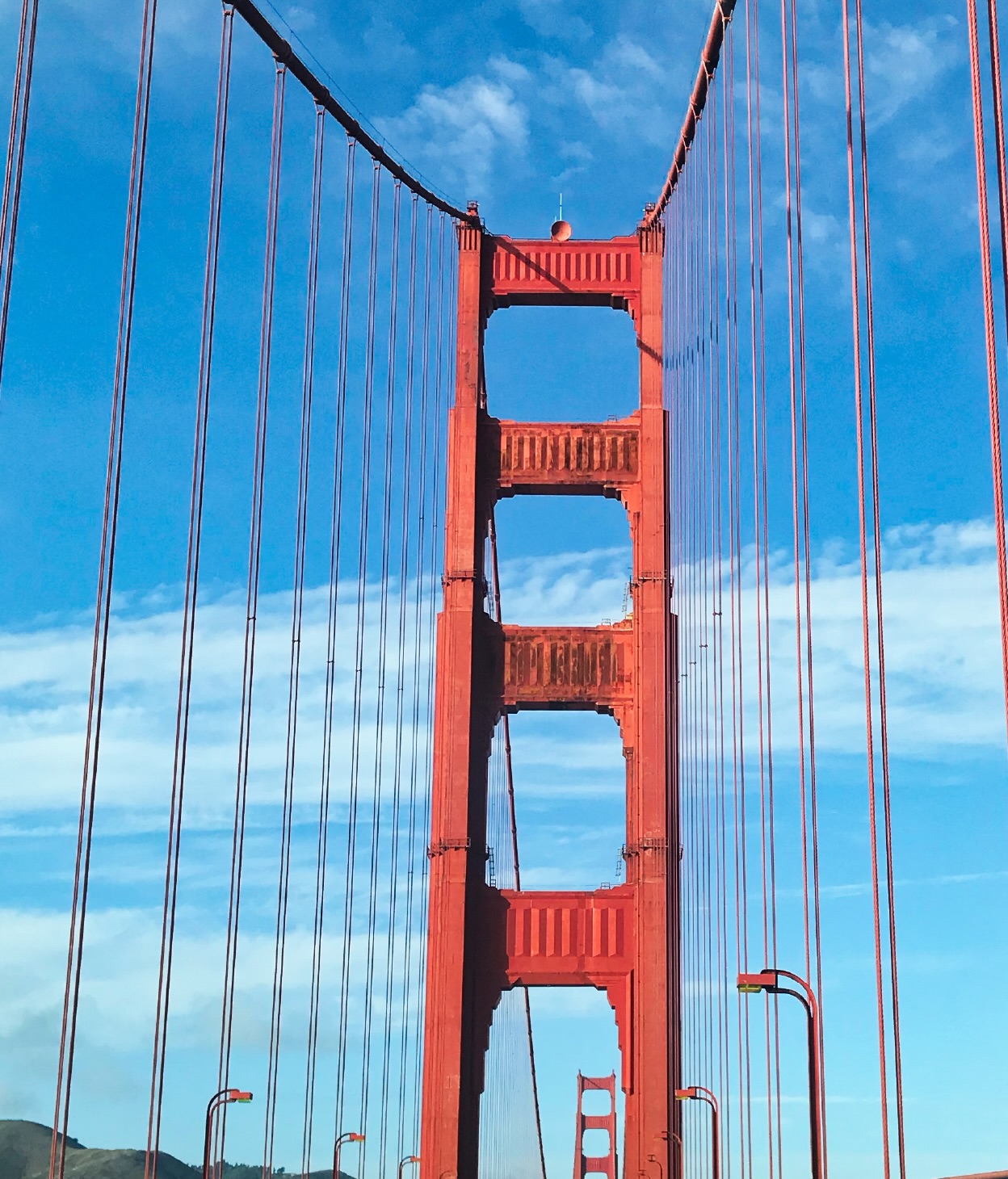 Close up of one of the Gold Gate Bridge's support towers from street view