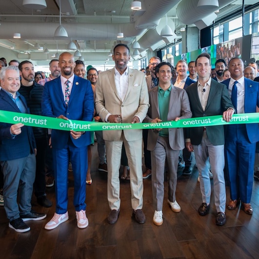 Atlanta city leadership and OneTrust executives cut the ribbon at the new OneTrust headquarters
